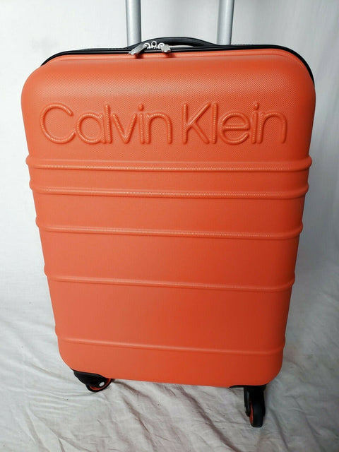 New Calvin Klein Fillmore 21" Carry On Hard side Luggage Orange Spinner