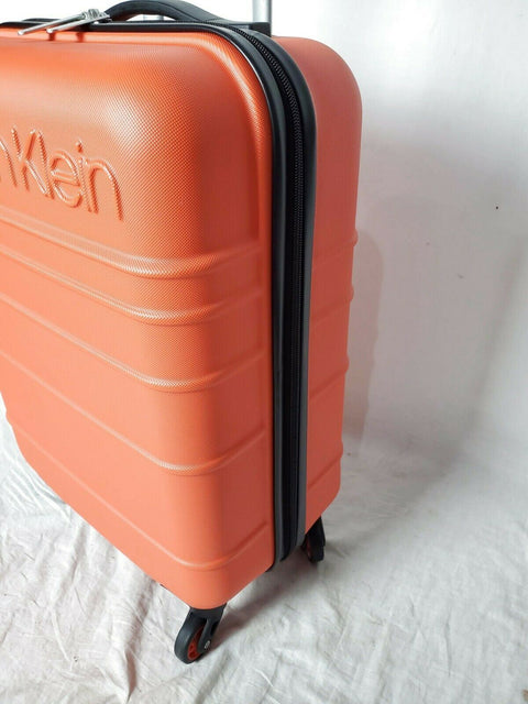New Calvin Klein Fillmore 21" Carry On Hard side Luggage Orange Spinner