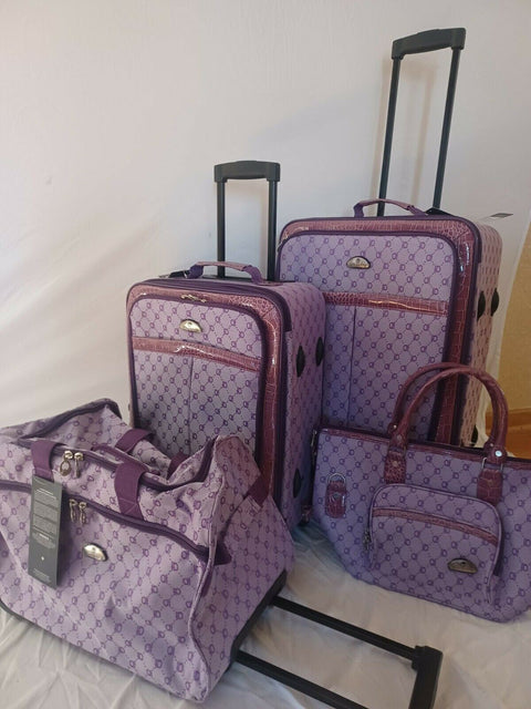$580 American Flyer Luggage Signature 4 Piece Luggage Set Purple Two Wheeled