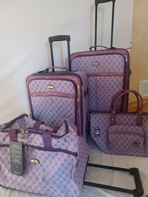 $580 American Flyer Luggage Signature 4 Piece Luggage Set Purple Two Wheeled