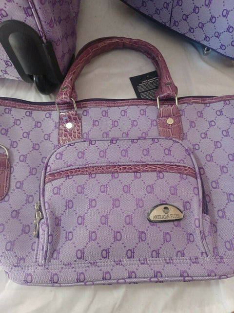 $580 American Flyer Luggage Signature 4 Piece Luggage Set Purple Two Wheeled