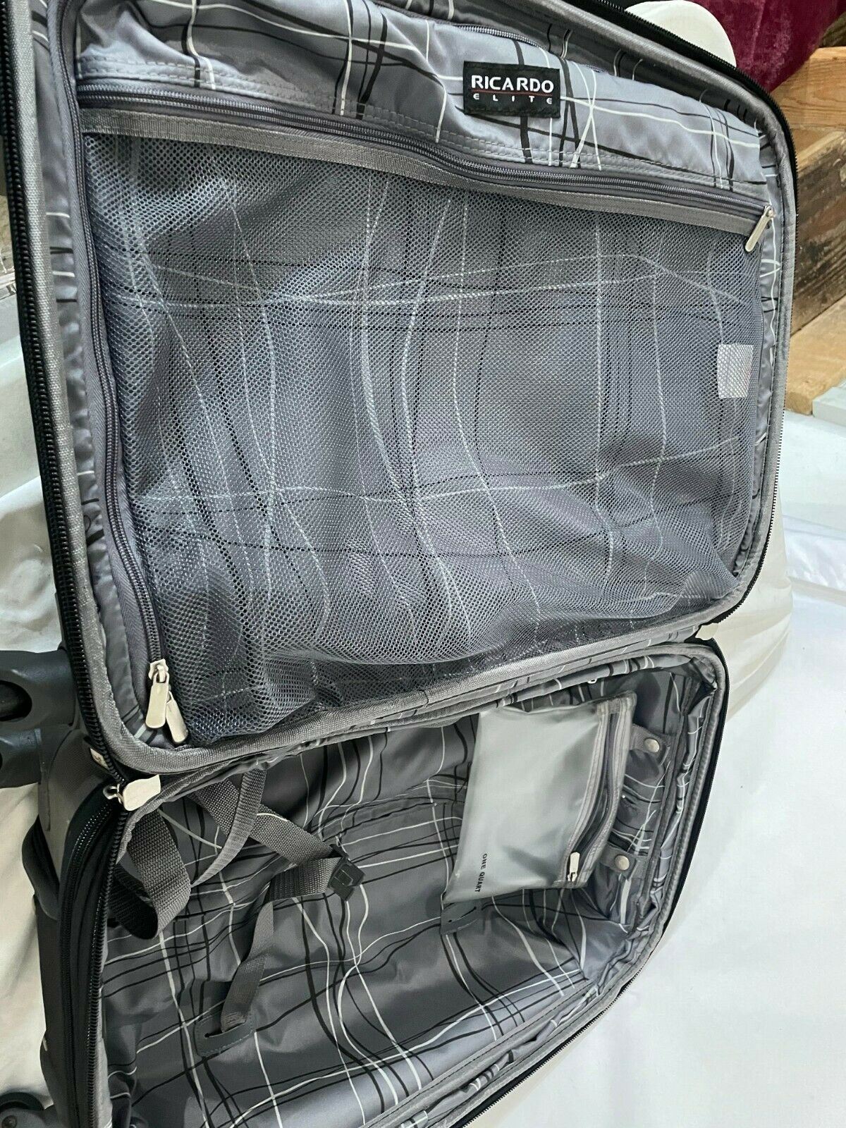 280 Ricardo 22"" Softside CarryOn Spinner Luggage Suitcase