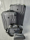 $300 New TAG Legacy 4 Piece Luggage Set Hard side Suitcase Gray Spinner