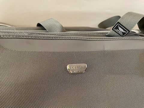 Delsey Two Wheeled Duffel Travel Bag Rolling Wheeled Silver Gray 22" carry on