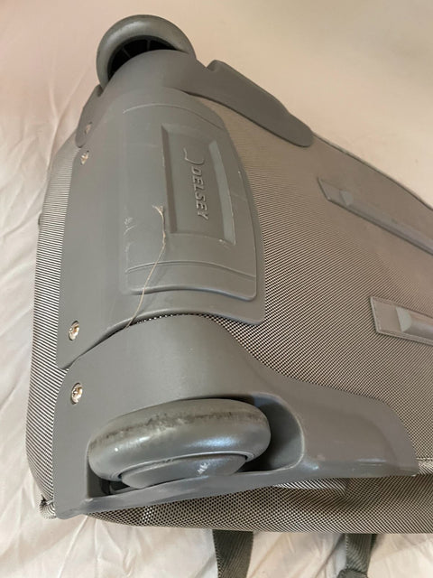 Delsey Two Wheeled Duffel Travel Bag Rolling Wheeled Silver Gray 22" carry on